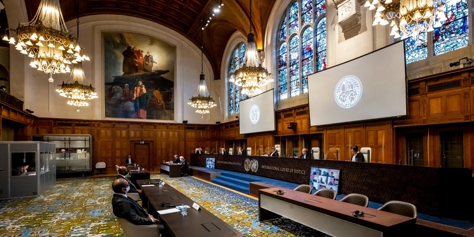 The International Court of Justice (ICJ), principal judicial organ of the UN, delivers its Judgment in the case concerning the Arbitral Award of 3 October 1899 (Guyana v. Venezuela) on 18 December 2020 at the Peace Palace in The Hague, the seat of the Court.  Session held under the presidency of Judge Abdulqawi Ahmed Yusuf, President of the Court. The Court’s role is to settle, in accordance with international law, legal disputes submitted to it by States (its Judgments are final and binding) and to give advisory opinions on legal questions referred to it by authorized UN organs and agencies.